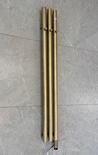 Вертикальна рушникосушка електрична Terma ROLO HANGER 1200x150 Brushed Brass, тен ONE з правої сторони WLROW120015KBBSE8ORXMX0
